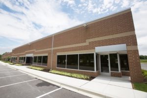 Tollos leases 18,000 square feet of space and Kershner Environmental Technologies signs for 6,000 square feet